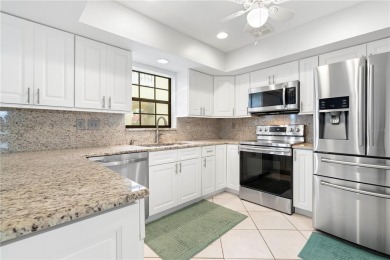 STUNNING WATERFRONT TOWNHOME IN PGI W/DEEDED DOCK - Discover the on Saint Andrews South Golf Club in Florida - for sale on GolfHomes.com, golf home, golf lot