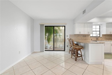STUNNING WATERFRONT TOWNHOME IN PGI W/DEEDED DOCK - Discover the on Saint Andrews South Golf Club in Florida - for sale on GolfHomes.com, golf home, golf lot