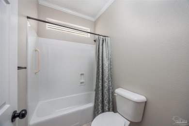 Welcome to this beautifully maintained 3-bedroom, 2-bath on Tiger Point Golf and Country Club in Florida - for sale on GolfHomes.com, golf home, golf lot