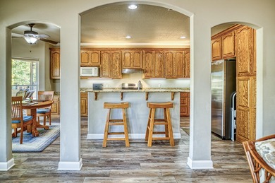Imagine sitting on the huge shade filled, all stone, covered on Granada Golf Course in Arkansas - for sale on GolfHomes.com, golf home, golf lot