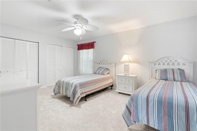 STUNNING WATERFRONT TOWNHOME IN PGI W/DEEDED DOCK - Discover the on Saint Andrews South Golf Club in Florida - for sale on GolfHomes.com, golf home, golf lot