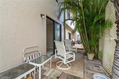 STUNNING WATERFRONT TOWNHOME IN PGI W/DEEDED DOCK - Discover the on Saint Andrews South Golf Club in Florida - for sale on GolfHomes.com, golf home, golf lot