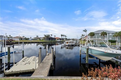 STUNNING WATERFRONT TOWNHOME IN PGI W/DEEDED DOCK - Discover the on Saint Andrews South Golf Club in Florida - for sale on GolfHomes.com, golf home, golf lot