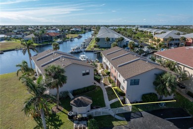 STUNNING WATERFRONT TOWNHOME IN PGI W/DEEDED DOCK - Discover the on Saint Andrews South Golf Club in Florida - for sale on GolfHomes.com, golf home, golf lot