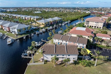 STUNNING WATERFRONT TOWNHOME IN PGI W/DEEDED DOCK - Discover the on Saint Andrews South Golf Club in Florida - for sale on GolfHomes.com, golf home, golf lot