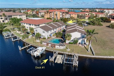 STUNNING WATERFRONT TOWNHOME IN PGI W/DEEDED DOCK - Discover the on Saint Andrews South Golf Club in Florida - for sale on GolfHomes.com, golf home, golf lot