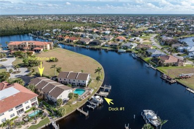 STUNNING WATERFRONT TOWNHOME IN PGI W/DEEDED DOCK - Discover the on Saint Andrews South Golf Club in Florida - for sale on GolfHomes.com, golf home, golf lot