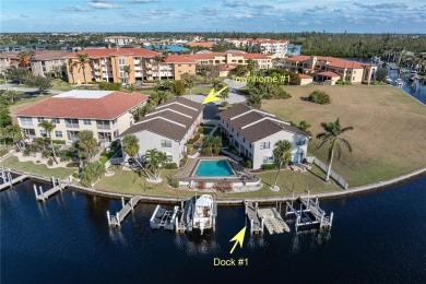 STUNNING WATERFRONT TOWNHOME IN PGI W/DEEDED DOCK - Discover the on Saint Andrews South Golf Club in Florida - for sale on GolfHomes.com, golf home, golf lot