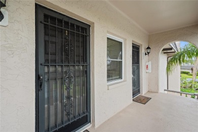 This top-floor condo sits high and dry in a non-flood zone on Bayou Golf Club in Florida - for sale on GolfHomes.com, golf home, golf lot