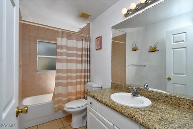 Welcome to the epitome of luxurious living at East Greens Condo! on Lehigh Resort Club in Florida - for sale on GolfHomes.com, golf home, golf lot