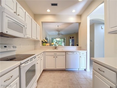 IMMACULATELY maintained, MAINTENANCE FREE attached villa in on Herons Glen Golf and Country Club in Florida - for sale on GolfHomes.com, golf home, golf lot