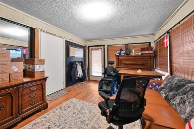 Rare opportunity to own a home on a DOUBLE lot right on the on Hide-A-Way Lake Golf Course in Texas - for sale on GolfHomes.com, golf home, golf lot