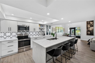 If space, style, and a standout kitchen are high on your list on The Landings Yacht, Golf and Tennis Club in Florida - for sale on GolfHomes.com, golf home, golf lot