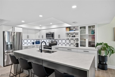 If space, style, and a standout kitchen are high on your list on The Landings Yacht, Golf and Tennis Club in Florida - for sale on GolfHomes.com, golf home, golf lot