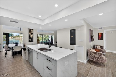 If space, style, and a standout kitchen are high on your list on The Landings Yacht, Golf and Tennis Club in Florida - for sale on GolfHomes.com, golf home, golf lot