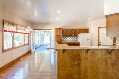 Custom built 3-bedroom, 2 bath rancher style home in the on Sound Golf Links at Albemarle Plantation in North Carolina - for sale on GolfHomes.com, golf home, golf lot