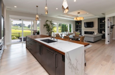 Majestic views. Unrivaled privacy. Walls of glass invite on Wakonda Club in Iowa - for sale on GolfHomes.com, golf home, golf lot