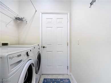 IMMACULATELY maintained, MAINTENANCE FREE attached villa in on Herons Glen Golf and Country Club in Florida - for sale on GolfHomes.com, golf home, golf lot
