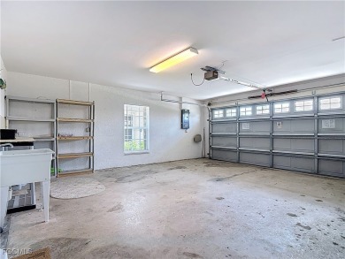 IMMACULATELY maintained, MAINTENANCE FREE attached villa in on Herons Glen Golf and Country Club in Florida - for sale on GolfHomes.com, golf home, golf lot
