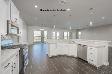 Welcome to this stunning new construction home located in the on Los Lagos Golf Club in Arizona - for sale on GolfHomes.com, golf home, golf lot