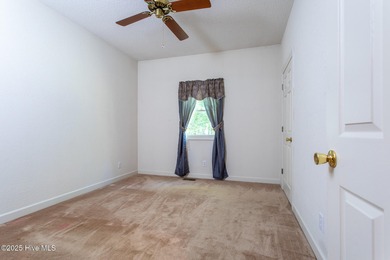 Custom built 3-bedroom, 2 bath rancher style home in the on Sound Golf Links at Albemarle Plantation in North Carolina - for sale on GolfHomes.com, golf home, golf lot