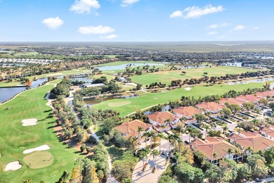 Beautifully appointed first-floor coach home in the double-gated on The Rookery At Marco in Florida - for sale on GolfHomes.com, golf home, golf lot