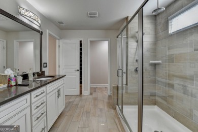 Nestled in a serene cul-de-sac, this meticulously maintained on Reunion Golf Club in Georgia - for sale on GolfHomes.com, golf home, golf lot