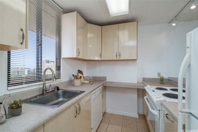 Enjoy stunning views and ideal island living from this on Ala Wai Golf Course in Hawaii - for sale on GolfHomes.com, golf home, golf lot