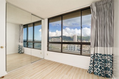 Enjoy stunning views and ideal island living from this on Ala Wai Golf Course in Hawaii - for sale on GolfHomes.com, golf home, golf lot