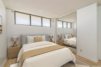 Enjoy stunning views and ideal island living from this on Ala Wai Golf Course in Hawaii - for sale on GolfHomes.com, golf home, golf lot