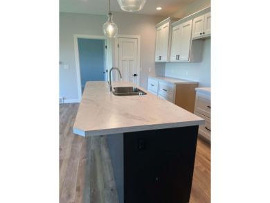 Check out this new build just a few blocks from the golf course on Sanborn Golf and Country Club in Iowa - for sale on GolfHomes.com, golf home, golf lot