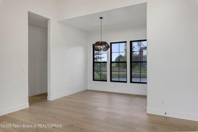 This custom home in Teton Reserve offers a unique plan with on Teton Reserve in Idaho - for sale on GolfHomes.com, golf home, golf lot