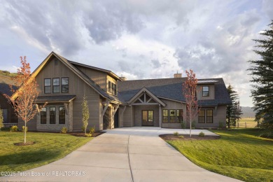 This custom home in Teton Reserve offers a unique plan with on Teton Reserve in Idaho - for sale on GolfHomes.com, golf home, golf lot