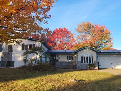 A remarkably well built property on a beautiful 18 hole on The Oaks At Kincheloe in Michigan - for sale on GolfHomes.com, golf home, golf lot