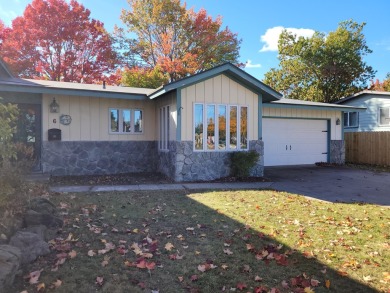 A remarkably well built property on a beautiful 18 hole on The Oaks At Kincheloe in Michigan - for sale on GolfHomes.com, golf home, golf lot