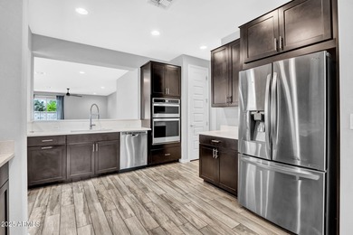 Welcome to your dream home in a serene, gated community! This on The Legacy Golf Resort in Arizona - for sale on GolfHomes.com, golf home, golf lot