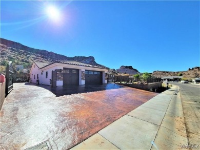 Situated alongside the scenic Cerbat Cliffs Golf Course, this on Cerbat Cliffs Golf Course in Arizona - for sale on GolfHomes.com, golf home, golf lot