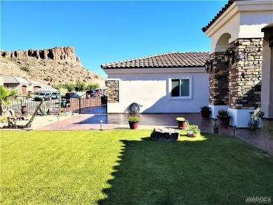 Situated alongside the scenic Cerbat Cliffs Golf Course, this on Cerbat Cliffs Golf Course in Arizona - for sale on GolfHomes.com, golf home, golf lot