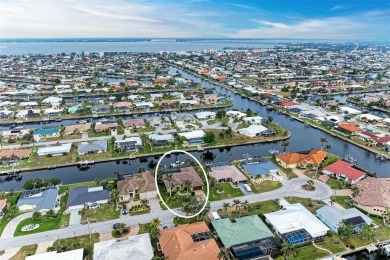 WATERFRONT LUXURY AWAITS at this gorgeous 2013 built custom POOL on Saint Andrews South Golf Club in Florida - for sale on GolfHomes.com, golf home, golf lot