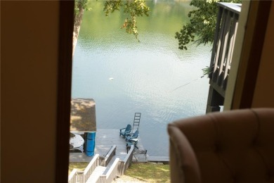 Gorgeous Lake Front Home w/ Private Dock! This 4-bedroom home on Bella Vista Country Club - Berksdale in Arkansas - for sale on GolfHomes.com, golf home, golf lot