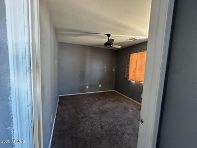 Investor special! Spacious 5-bedroom, 2.5-bath fixer-upper on Oasis Golf Club in Arizona - for sale on GolfHomes.com, golf home, golf lot