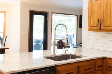 Gorgeous Lake Front Home w/ Private Dock! This 4-bedroom home on Bella Vista Country Club - Berksdale in Arkansas - for sale on GolfHomes.com, golf home, golf lot