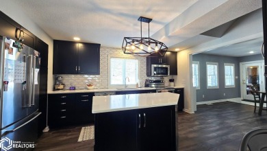 Discover unparalleled luxury in this stunning remodeled home on Bear Creek Golf Club in Iowa - for sale on GolfHomes.com, golf home, golf lot