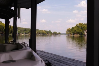 Gorgeous Lake Front Home w/ Private Dock! This 4-bedroom home on Bella Vista Country Club - Berksdale in Arkansas - for sale on GolfHomes.com, golf home, golf lot