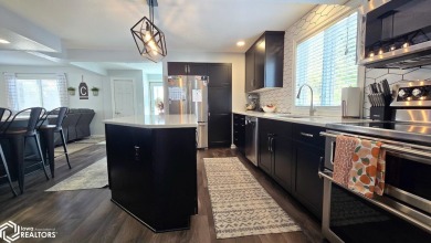 Discover unparalleled luxury in this stunning remodeled home on Bear Creek Golf Club in Iowa - for sale on GolfHomes.com, golf home, golf lot