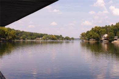 Gorgeous Lake Front Home w/ Private Dock! This 4-bedroom home on Bella Vista Country Club - Berksdale in Arkansas - for sale on GolfHomes.com, golf home, golf lot