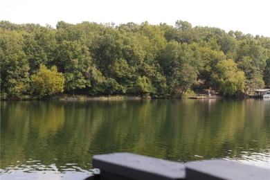 Gorgeous Lake Front Home w/ Private Dock! This 4-bedroom home on Bella Vista Country Club - Berksdale in Arkansas - for sale on GolfHomes.com, golf home, golf lot