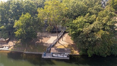 Gorgeous Lake Front Home w/ Private Dock! This 4-bedroom home on Bella Vista Country Club - Berksdale in Arkansas - for sale on GolfHomes.com, golf home, golf lot