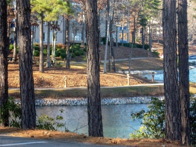 Nestled in the desirable full amenity community of Keowee Key on Keowee Key Golf and Country Club in South Carolina - for sale on GolfHomes.com, golf home, golf lot