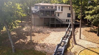 Lake Front Home w/ Private Dock! This 4-bedroom home features a on Bella Vista Country Club - Berksdale in Arkansas - for sale on GolfHomes.com, golf home, golf lot